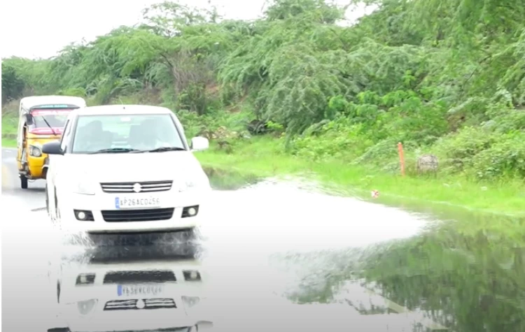 This Is A Road, Not A Pond, And When It Rains, The Worst Roads In Nellore Will Hurt The Motorbike Riders